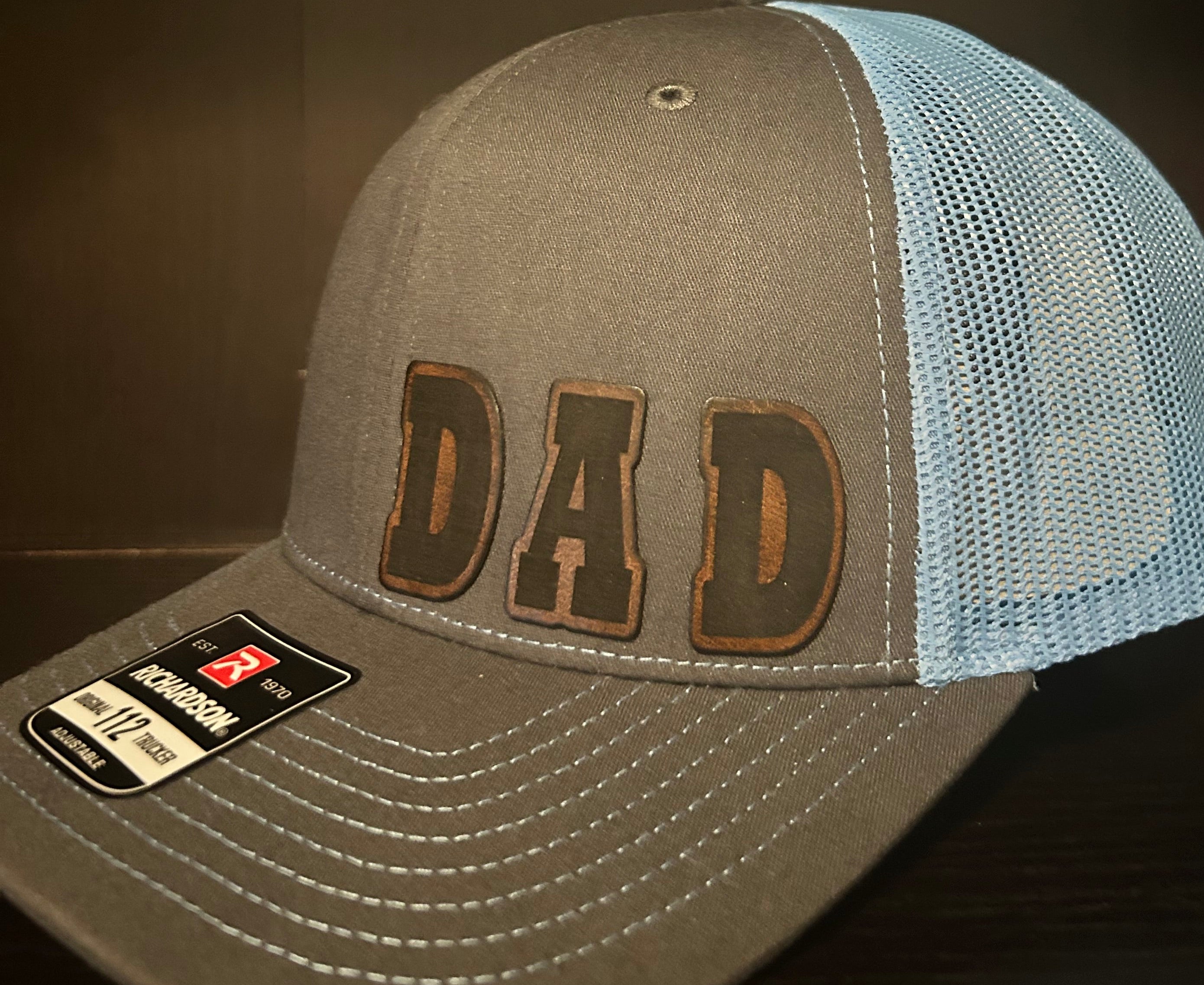 “D A D" custom leather patch on Trucker Hat Charcoal/Columbia Blue