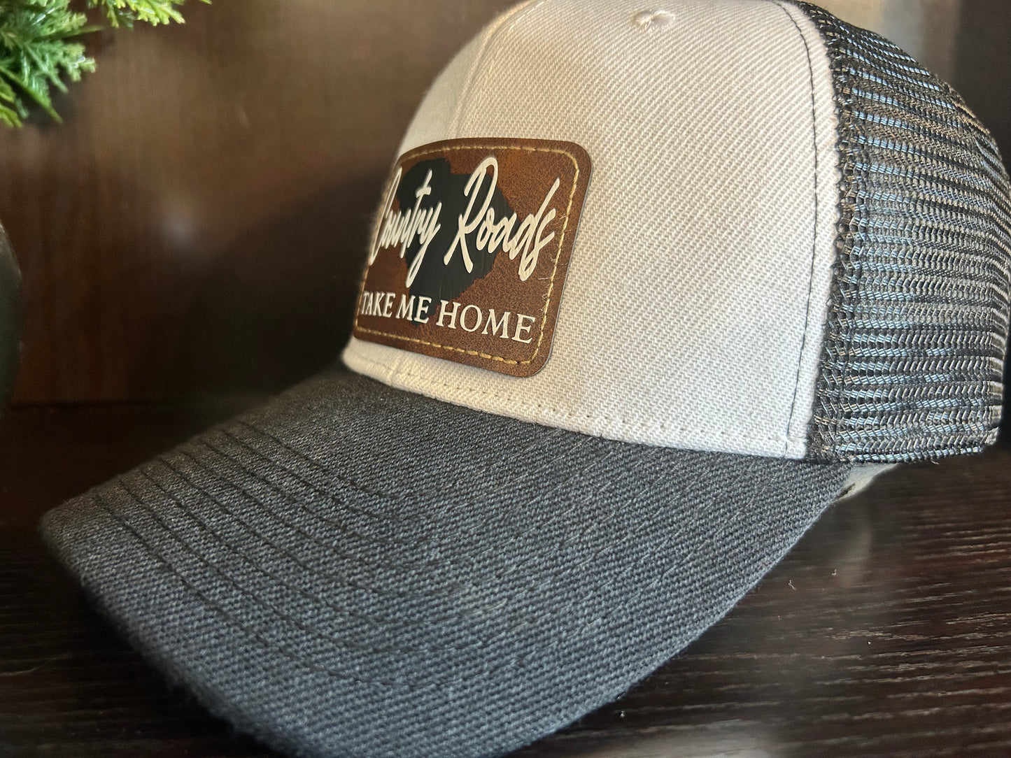 "Country Roads Take Me Home" with SC Background Patch on Trucker Hat