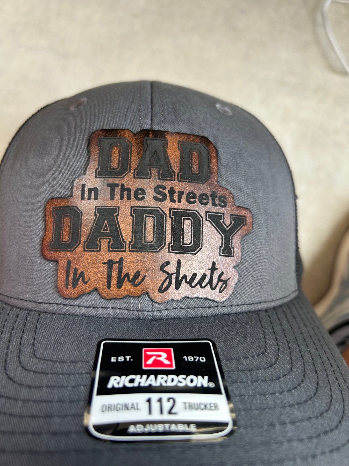 “DAD on the streets DADDY in the sheets" custom leather patch on Trucker Hat Charcoal/Black