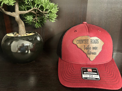 "Country Roads Take Me Home" on a SC shaped leather Patch on Trucker Hat Maroon/Black