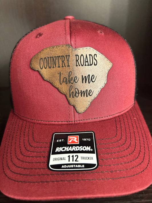 "Country Roads Take Me Home" on a SC shaped leather Patch on Trucker Hat Maroon/Black