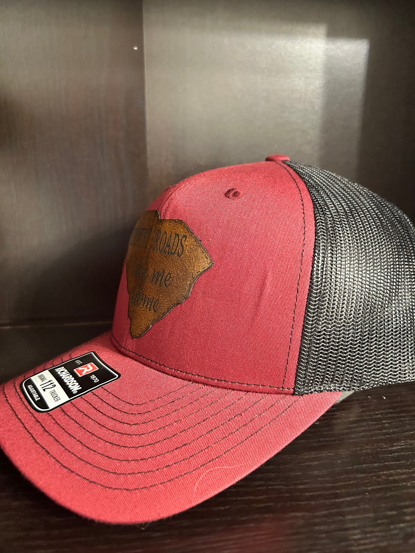 "Country Roads Take Me Home" on a SC shaped leather Patch on Trucker Hat Maroon/Black