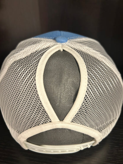 “Mama" on custom leather patch on a Trucker Hat with Pony Tail hole in the back Columbia Blue/White