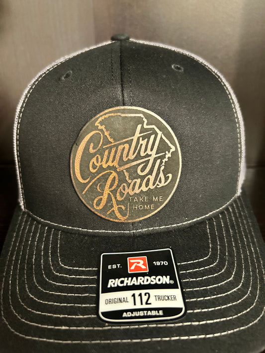 “Country Roads Take Me Home" custom leather patch on Trucker Hat Black/Charcoal
