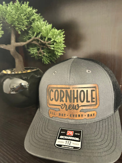 “Cornhole Crew All Day Everyday" custom leather patch on Trucker Hat Charcoal/Black