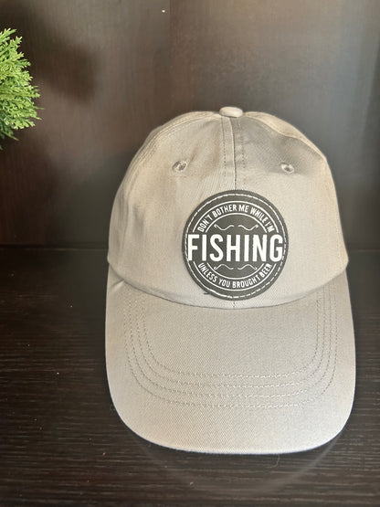 "Don't bother me while I'm FISHING unless you brought a beer" hat.