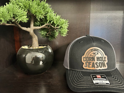 "It's Always Cornhole Season" Custom Patch on Black/Charcoal Trucker Hat